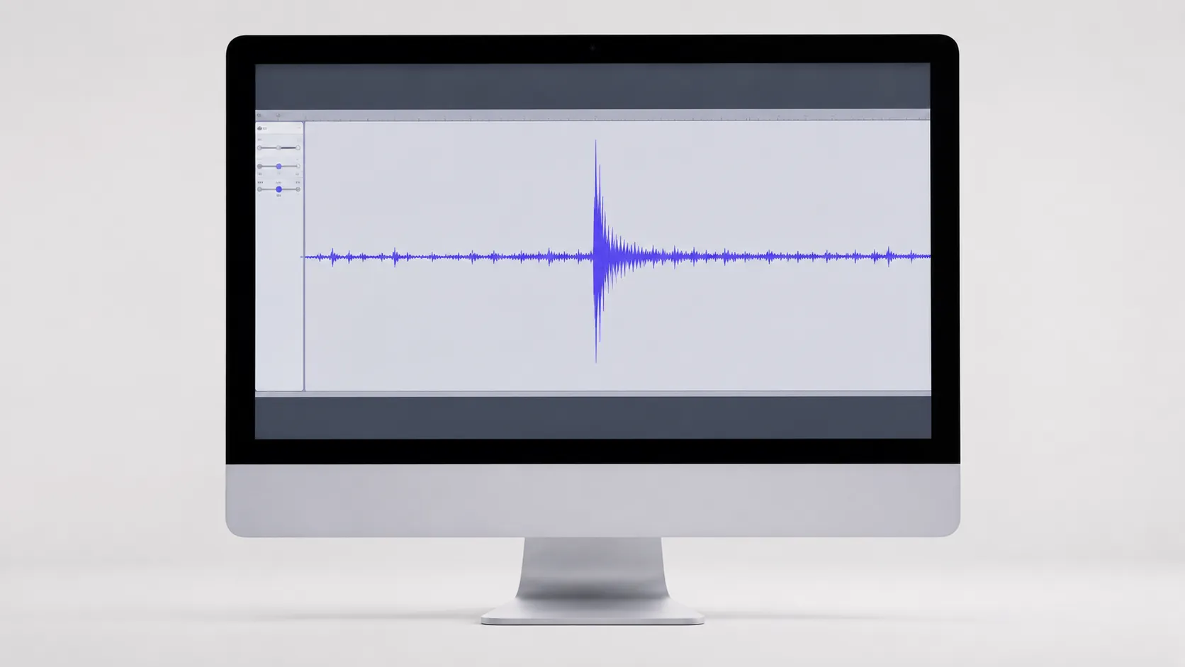 Audacity waveform with clap spike on an iMac screen showing audio editing for Mac voice recording
